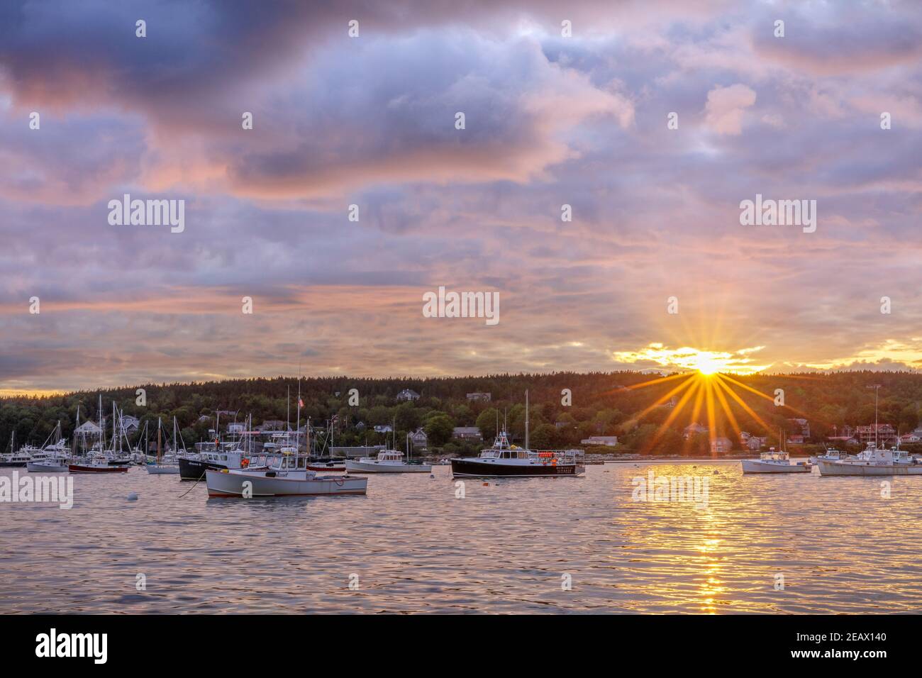 Mount Desert Island, Maine: Boats anchored in Southwest Harbor at sunset Stock Photo