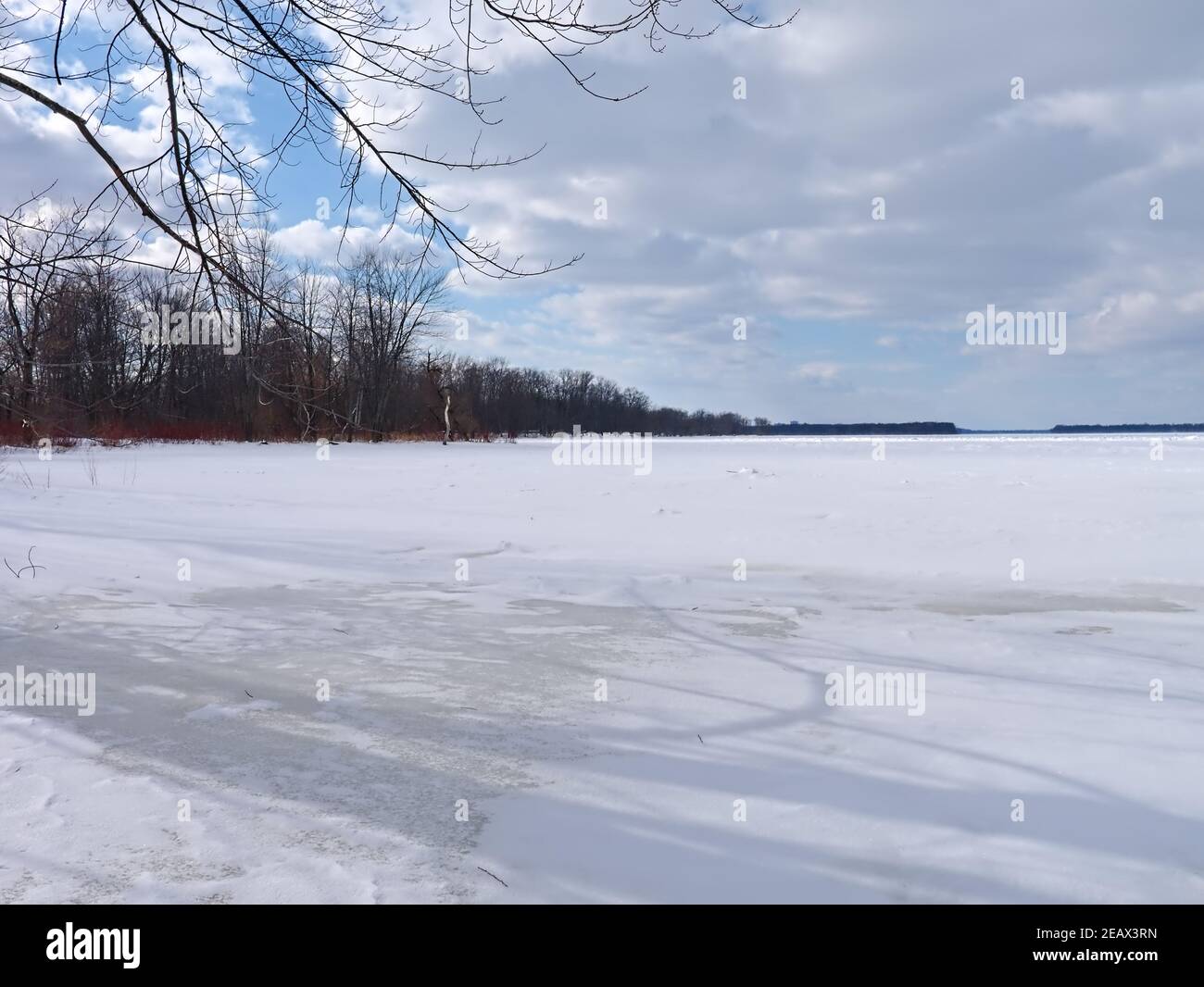 Starkly beautiful frozen Canadian winter landscape by the Ottawa River ...