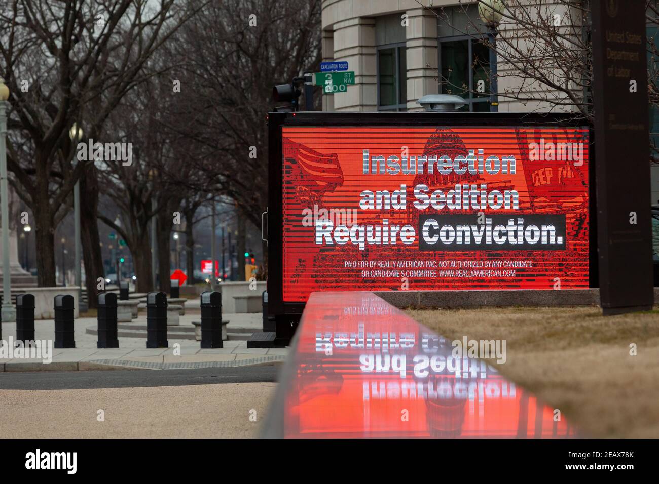 Washington, DC, USA, 10 February, 2021.  Pictured: A mobile advertisement just outside the Capitol grounds (at the intersection of 3rd Street and Pennsylvania Avenue NW) urged Senators to convict Trump on the second day of his trial for incitement of insurrection.  Credit: Allison C Bailey/Alamy Live News Stock Photo