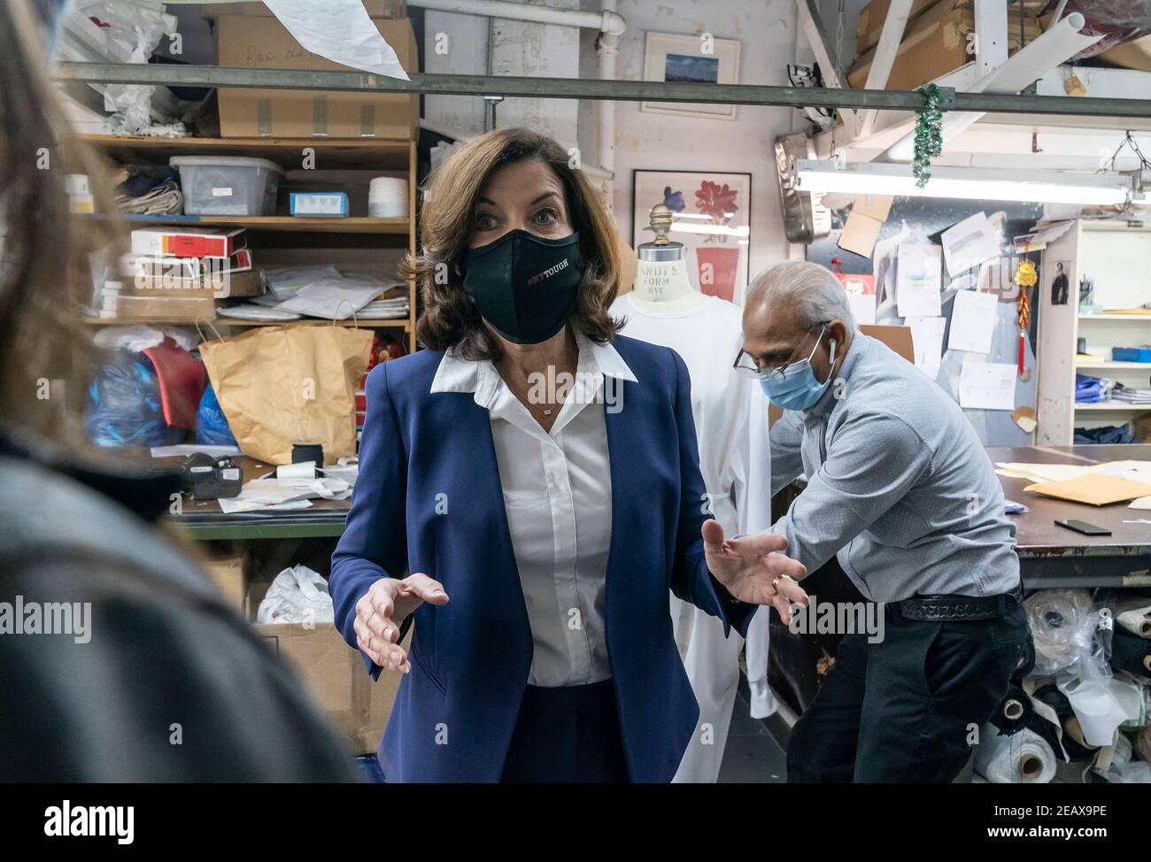 New York, United States. 10th Feb, 2021. LG Kathy Hochul visits Four Seasons Fashion as part of women-owned nonprofit Garment District for Gowns on 39th street of Manhattan in New York on February 10, 2021. LG was touring Four Season Fashion company owned by Tony Singh (in the back). (Photo by Lev Radin/Sipa USA) Credit: Sipa USA/Alamy Live News Stock Photo