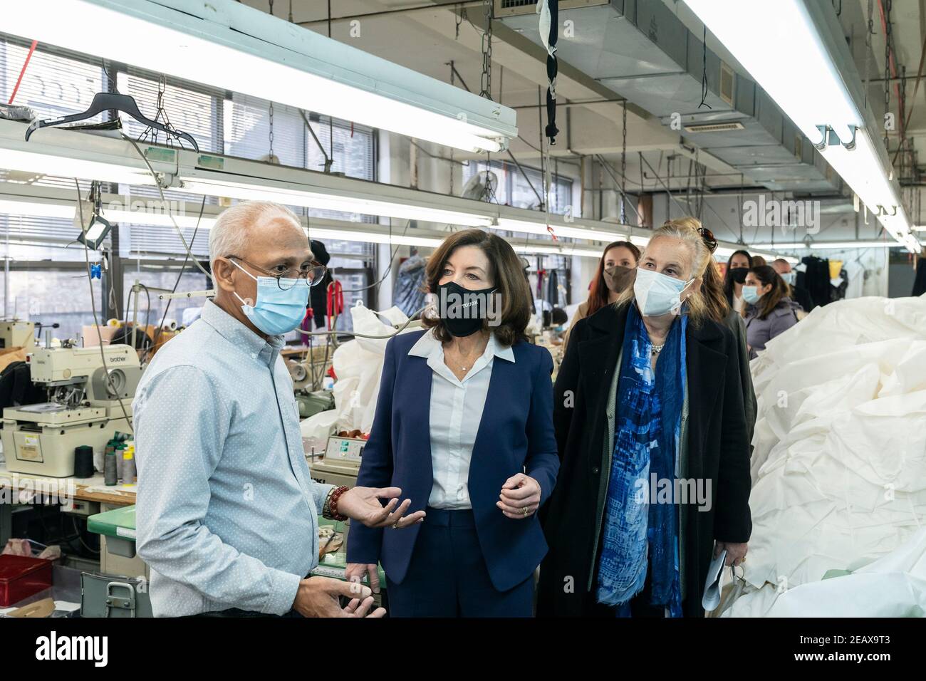 New York, United States. 10th Feb, 2021. LG Kathy Hochul visits Four Seasons Fashion as part of women-owned nonprofit Garment District for Gowns on 39th street of Manhattan in New York on February 10, 2021. LG was touring Four Season Fashion company owned by Tony Singh (L) and joined by Manhattan borough President Gail Brewer (R). (Photo by Lev Radin/Sipa USA) Credit: Sipa USA/Alamy Live News Stock Photo