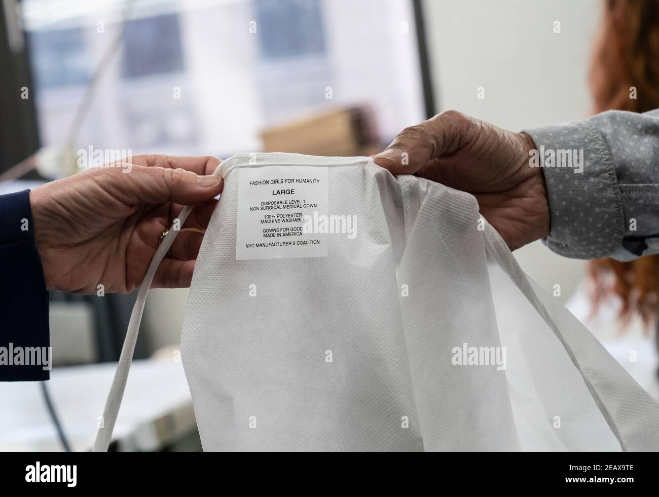 New York, United States. 10th Feb, 2021. LG Kathy Hochul visits Four Seasons Fashion as part of women-owned nonprofit Garment District for Gowns on 39th street of Manhattan in New York on February 10, 2021. LG was touring Four Season Fashion company owned by Tony Singh, on this photo seen a label from PPE with clear sign pointed to nonprofit organization and place of manufacture. (Photo by Lev Radin/Sipa USA) Credit: Sipa USA/Alamy Live News Stock Photo