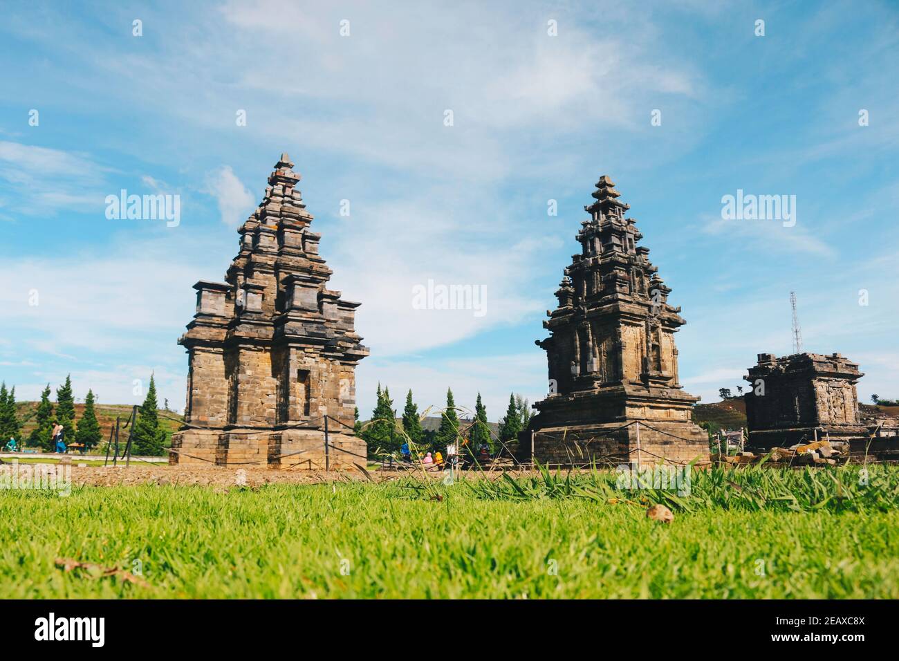 Local tourists visit Arjuna temple complex at Dieng Plateau. Stock Photo