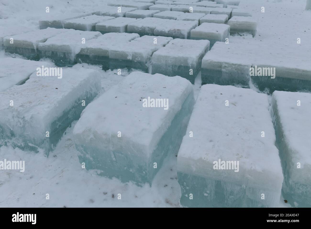 Winter scene with ice sculptures made from frozen blocks of lake water in the Adirondacks at Saranac Lake New York Stock Photo