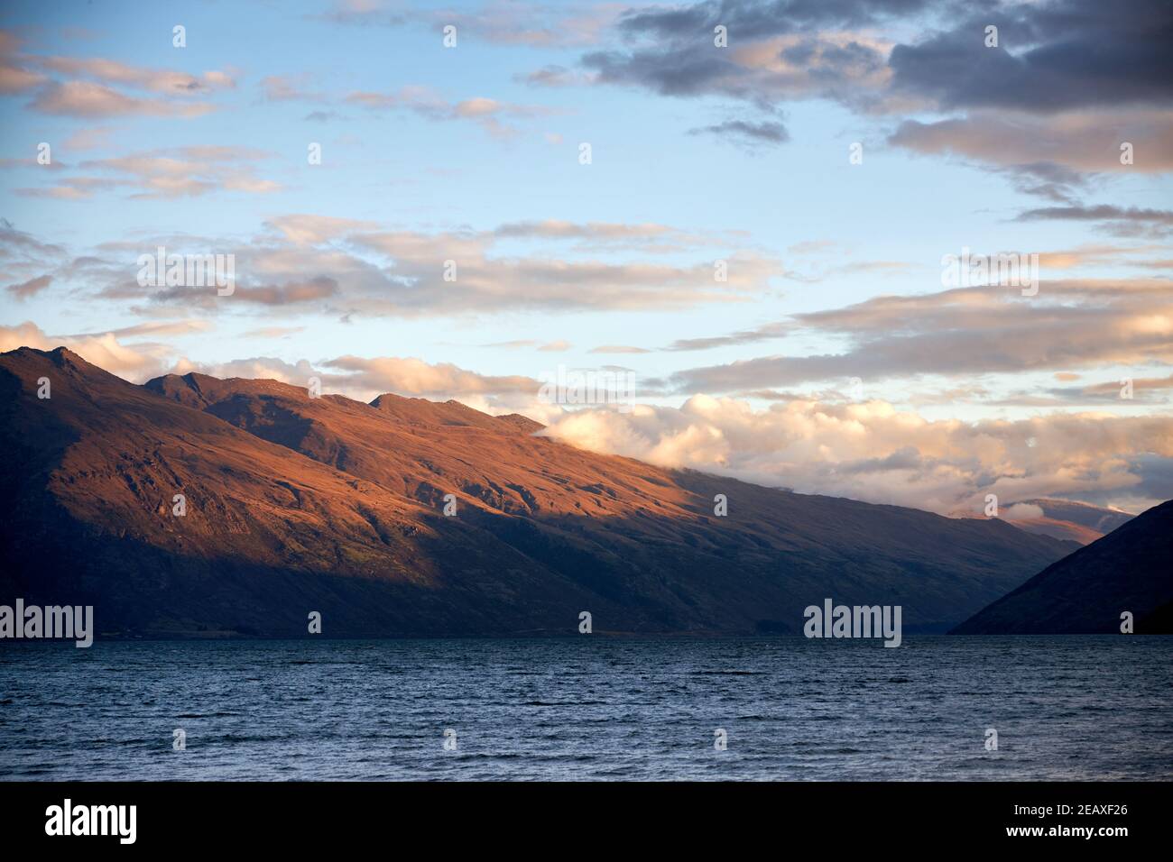Dusk over lake wakatipu and queenstown hi-res stock photography and ...