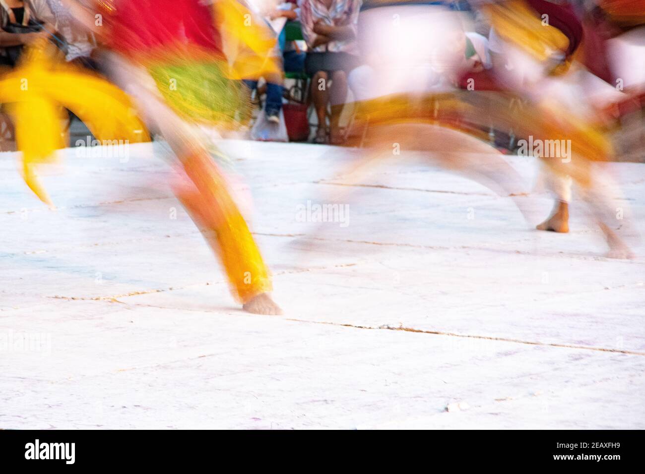 A group of dancers put on an exhibition showcasing various Indigenous tribes dance customs Stock Photo