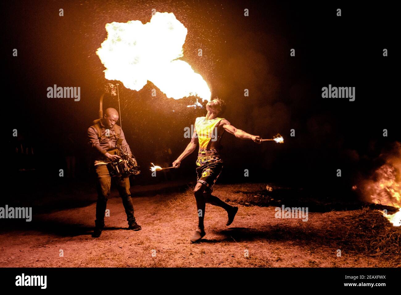 Acrobat Using Fire Nairobi, Kenya. 18th Aug, 2020. A Male acrobat is seen blowing fire ...