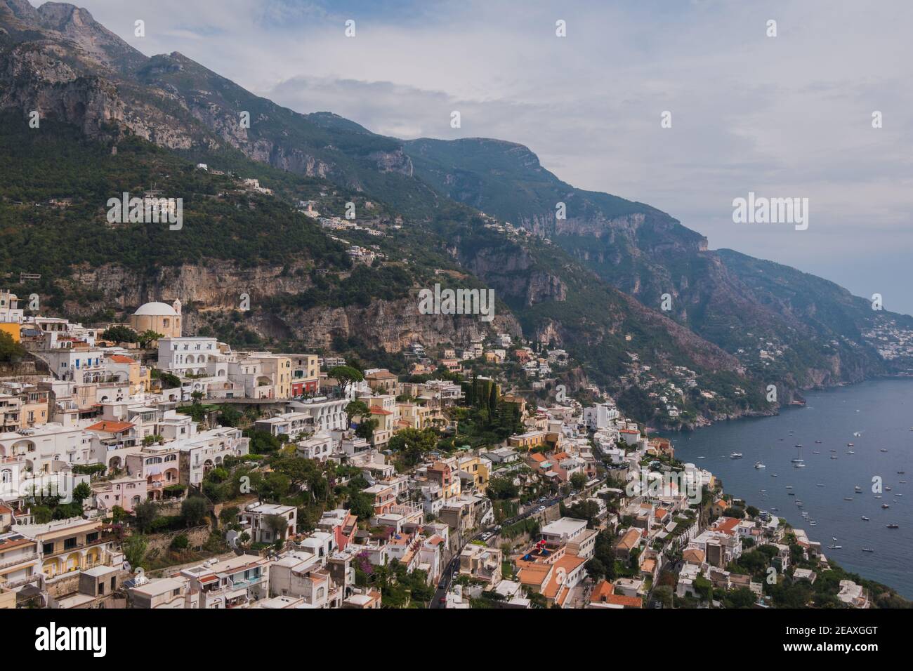 View over the village of Positano, sitting on the cliffside of the Amalfi Coast, Italy, overlooking the Tyrrhenian Sea. Stock Photo