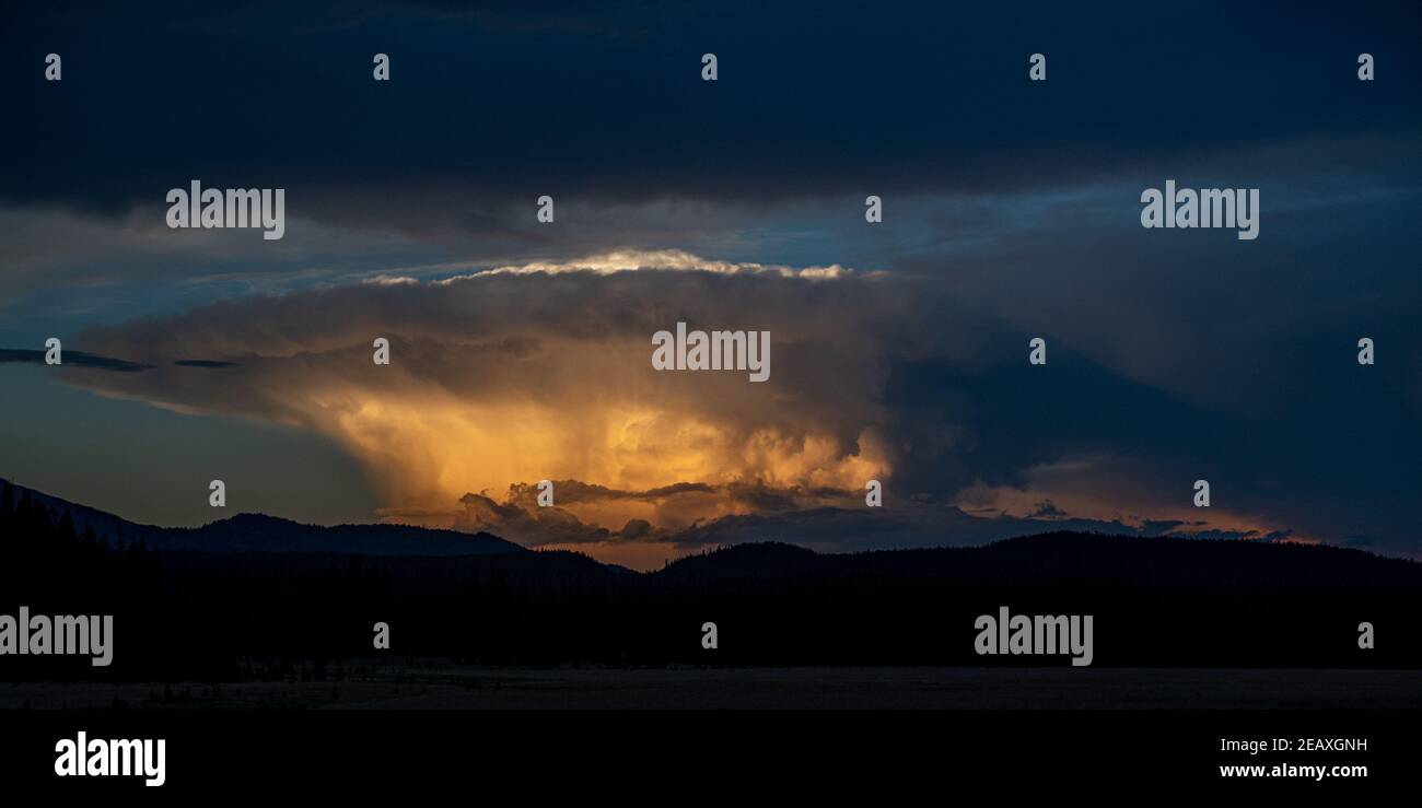 Thunderstorm brewing at sunset in Montana. Photo by Liz Roll Stock