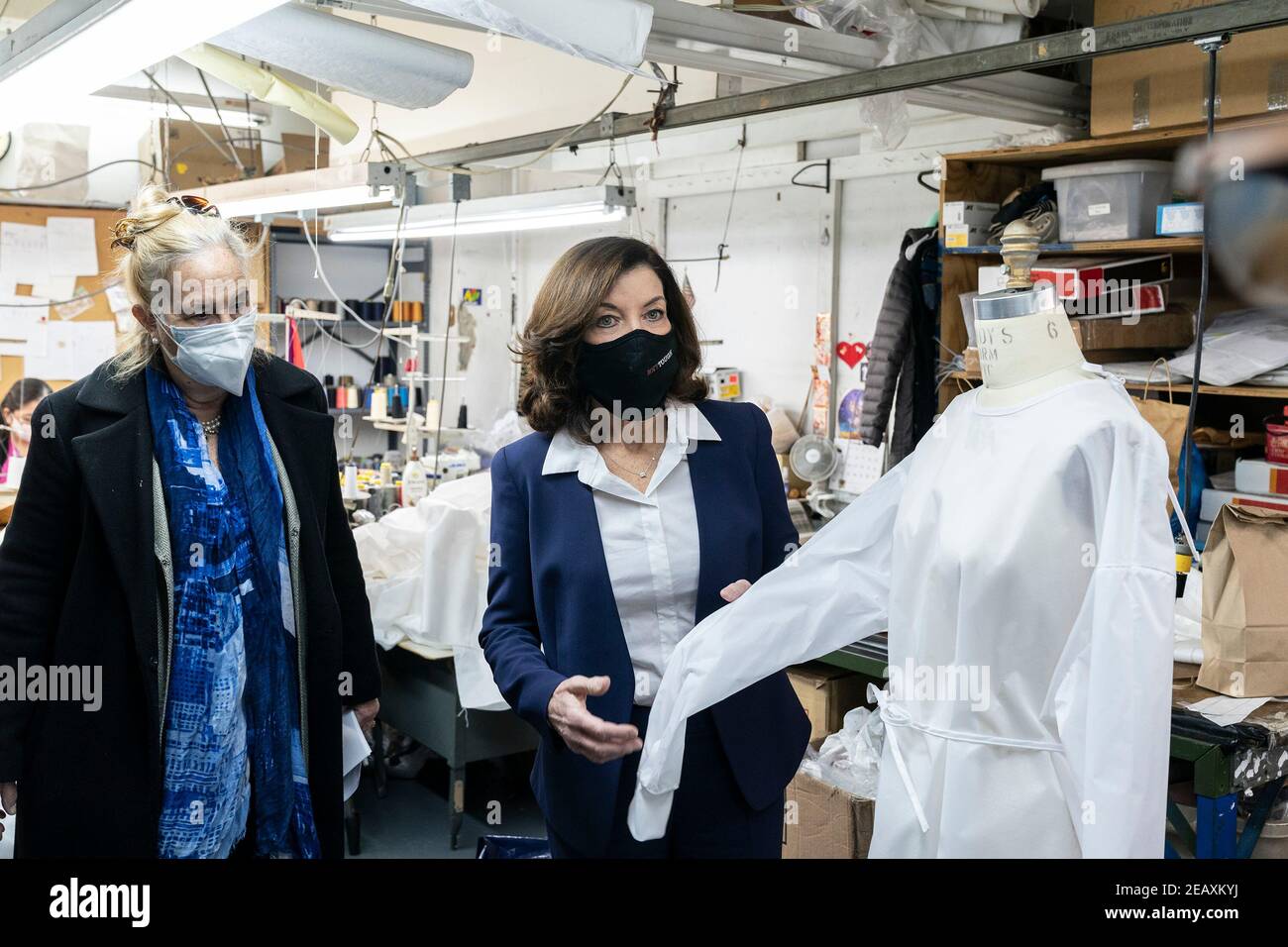 New York, United States. 10th Feb, 2021. LG Kathy Hochul visits Four Seasons Fashion as part of women-owned nonprofit Garment District for Gowns on 39th street of Manhattan. LG was touring Four Season Fashion company owned by Tony Singh (not pictured) and was joined by Manhattan borough President Gail Brewer (L). Nonprofit organization helped already to manufacture more than 300,000 PPE and sent them to New York State hospitals. (Photo by Lev Radin/Pacific Press) Credit: Pacific Press Media Production Corp./Alamy Live News Stock Photo