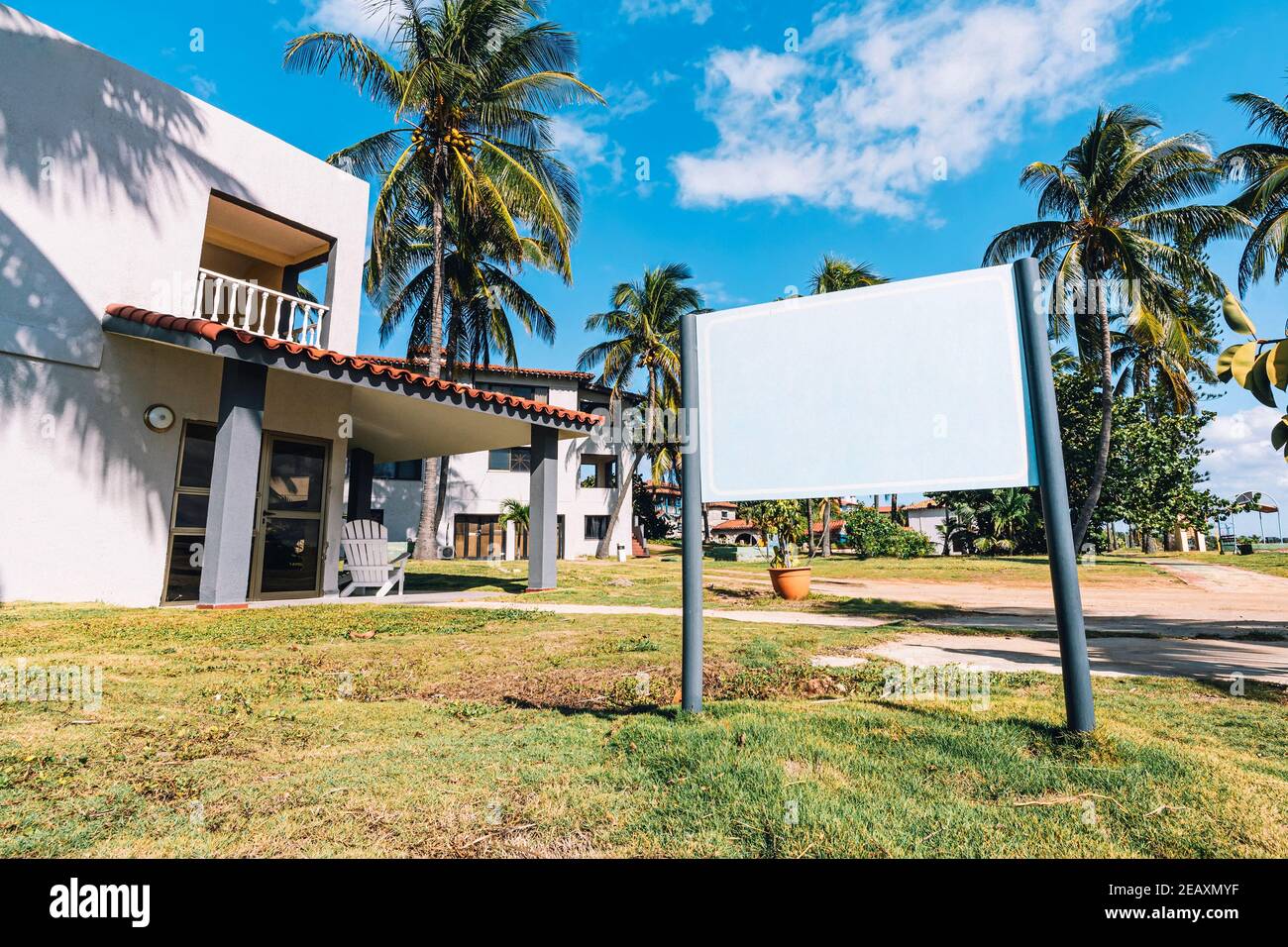 Blank Real Estate Sign in Front of Beautiful New House. space for text ...