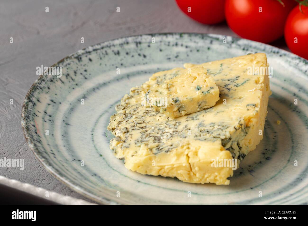 Close up of piece of blue cheese Stock Photo - Alamy
