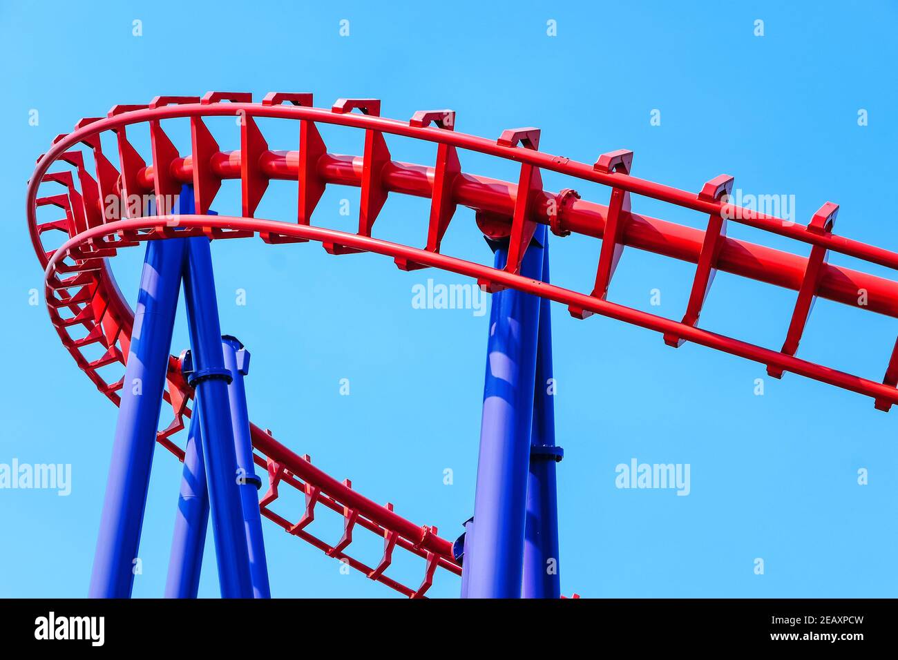 close-up image of a rollercoaster track and the blue sky Stock Photo - Alamy