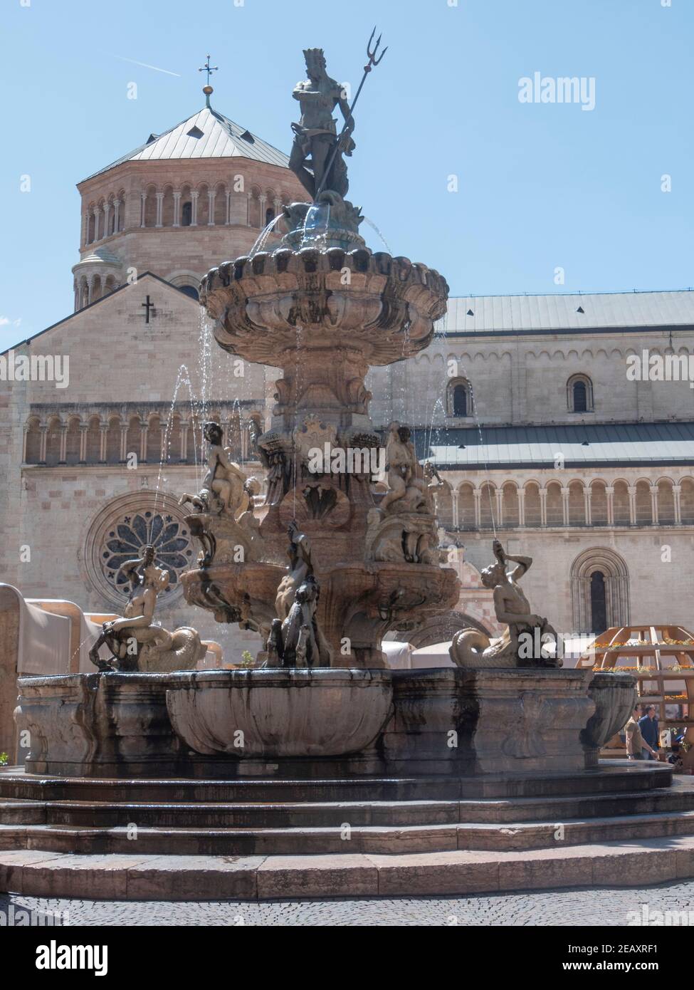 TRENTO, ITALY - JUNE, 1, 2019: fountain of neptune and trento cathedral in the main square Stock Photo