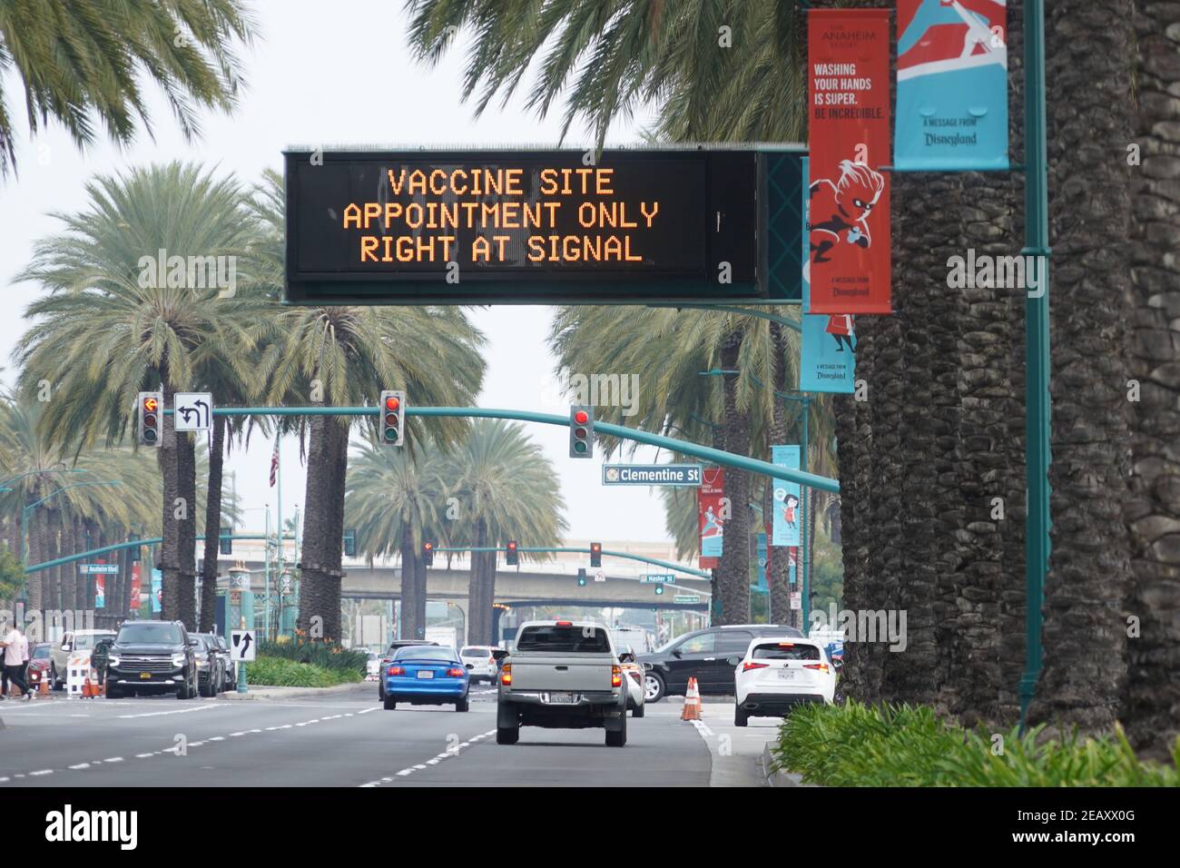 A directional sign on W. Katella Ave. for Super Point-of-Distribution coronavirus COVID-19 mass vaccination site in a Disneyland parking lot, Wednesda Stock Photo