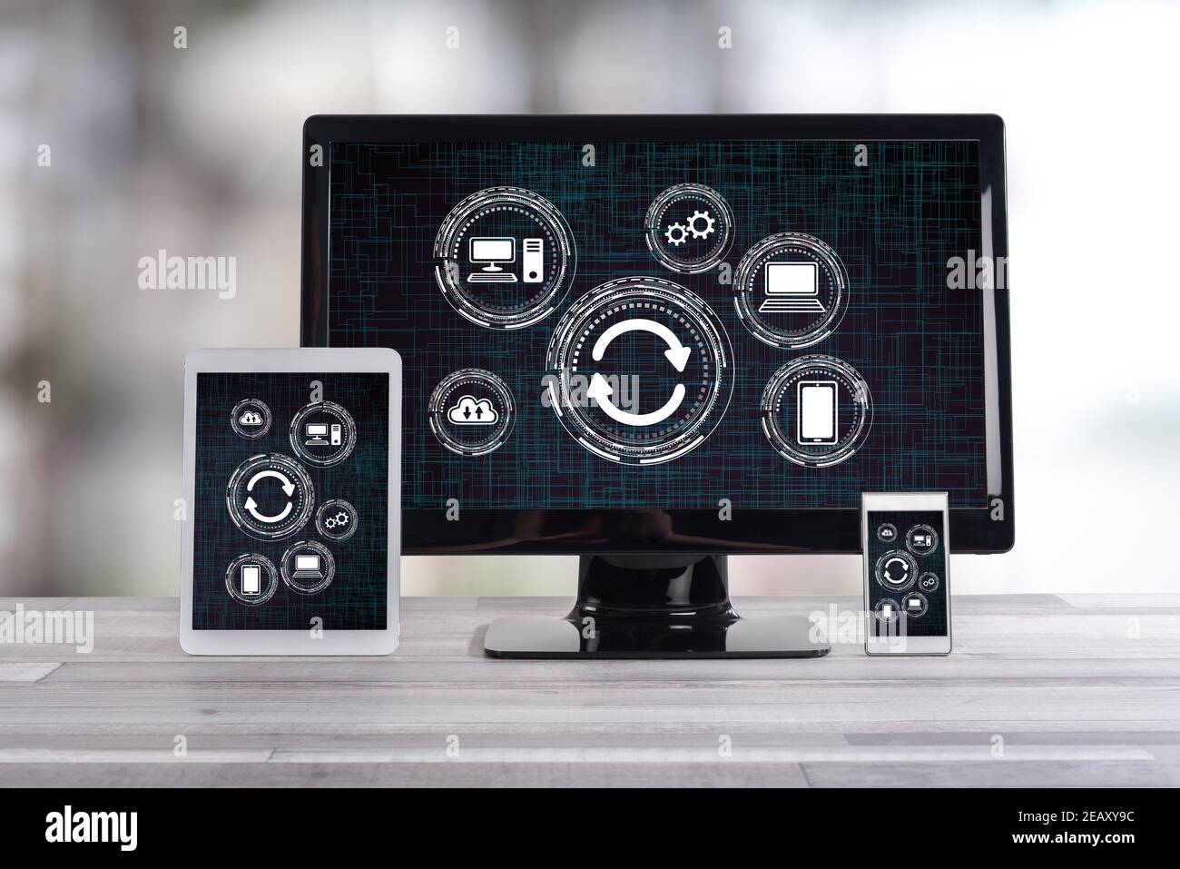 System update concept shown on different information technology devices Stock Photo