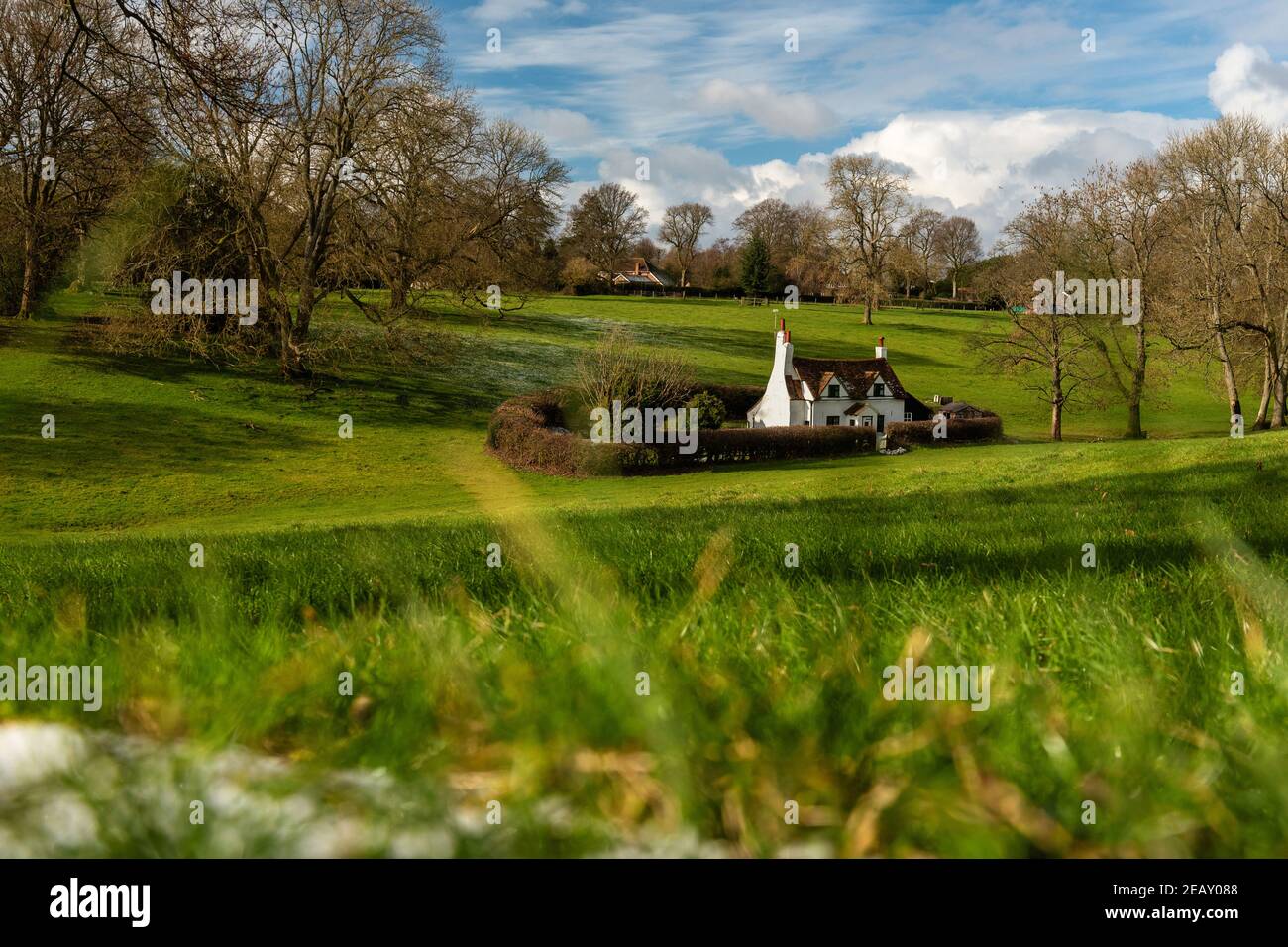 Sunny wintery landscape of Chiltern Hills with a little cottage among hills, England Stock Photo