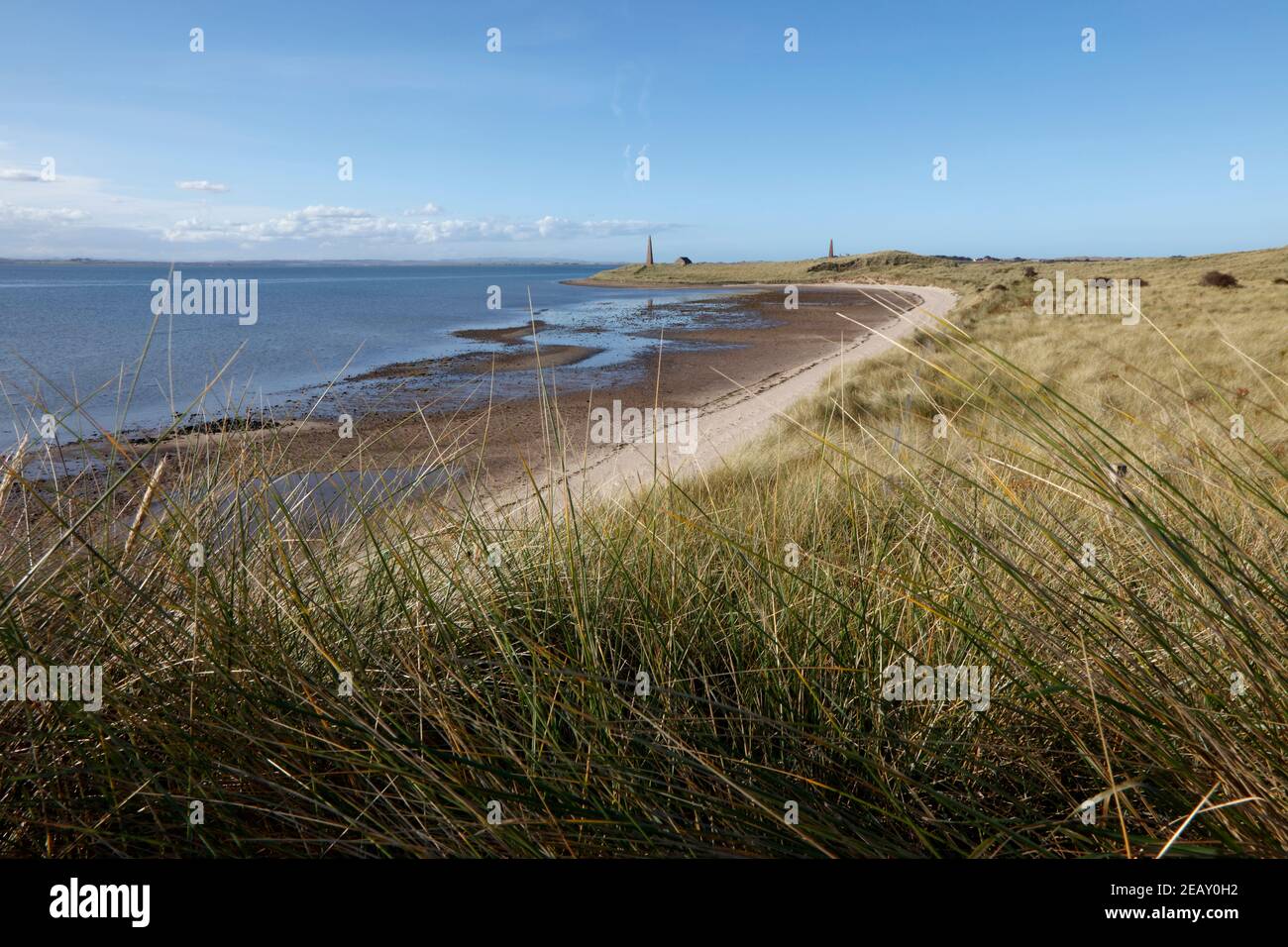 Navigation towers on Guile Point opposite Holy Island, Northumberland ...