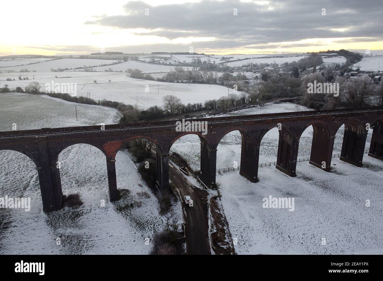Seaton, Rutland, UK. 11th February 2021. UK weather. The sun rises behind the Welland Valley Viaduct as the temperature in the UK plummeted to its lowest in a decade. Credit Darren Staples/Alamy Live News. Stock Photo