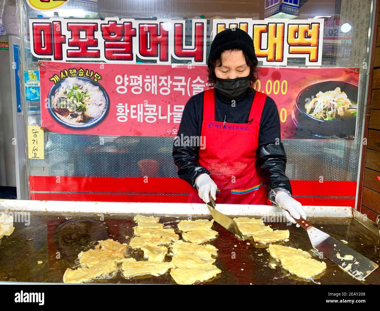 Lee Soon Ai Owner Of A Korean Traditional Pancake House For Over 15 Years Makes Pancakes