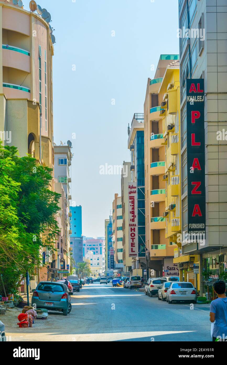 AJMAN, UAE, OCTOBER 24, 2016: View of a narrow street in the smallest of the United Arab Emirates - Ajman. Stock Photo