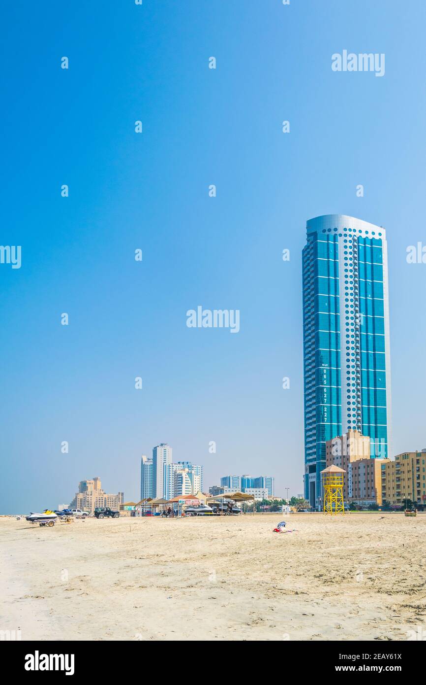 AJMAN, UAE, OCTOBER 24, 2016: Hotels stretched alongside beach in the smallest of the United Arab Emirates - Ajman. Stock Photo
