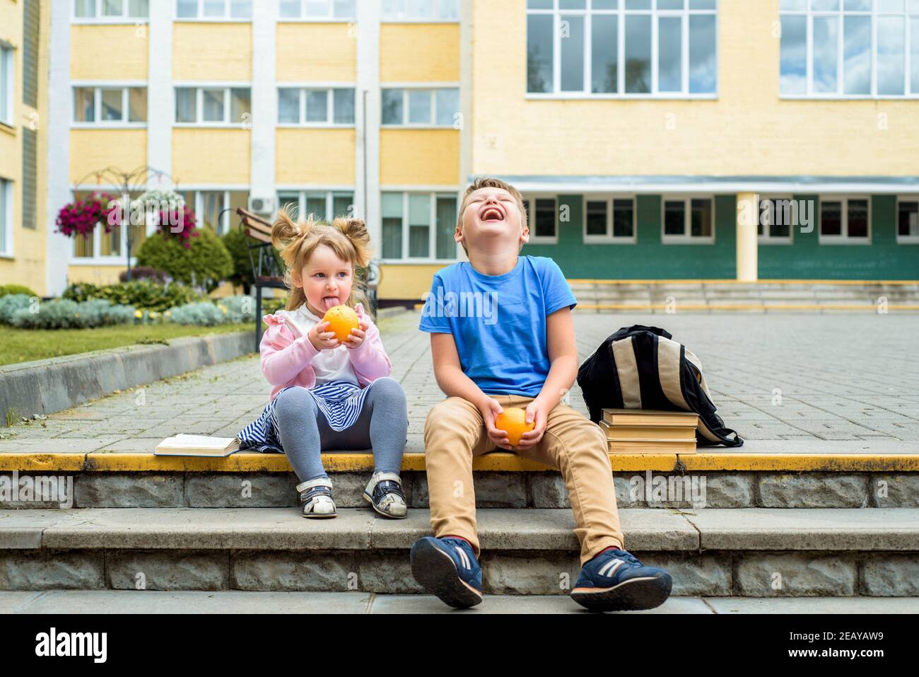 Children playing in school yard hi-res stock photography and images - Alamy