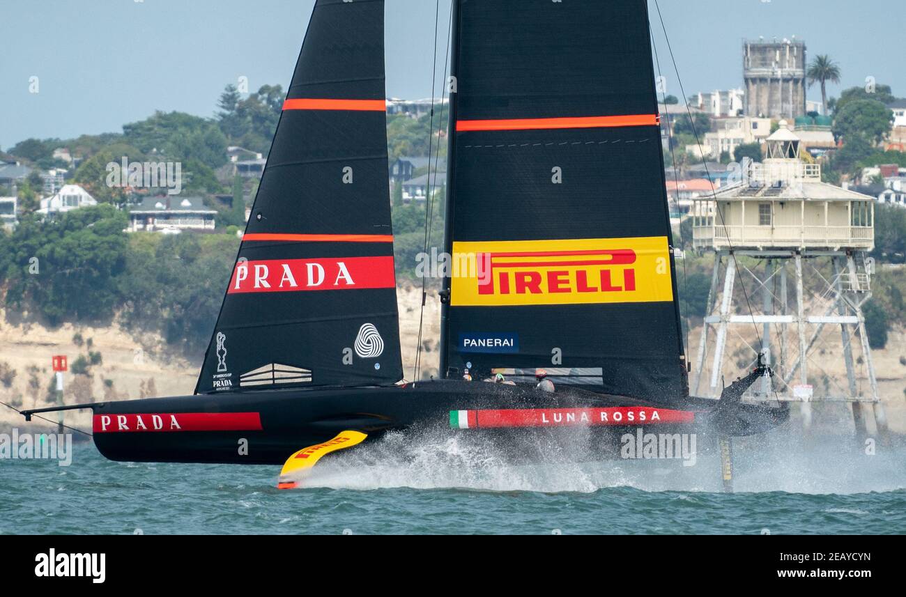 Auckland, New Zealand, 11 February, 2021 - Italian team Luna Rossa Prada  Pirelli passes Bean Rock lighthouse during practice on the Waitemata  Harbour ahead of the Prada Cup finals which starts on