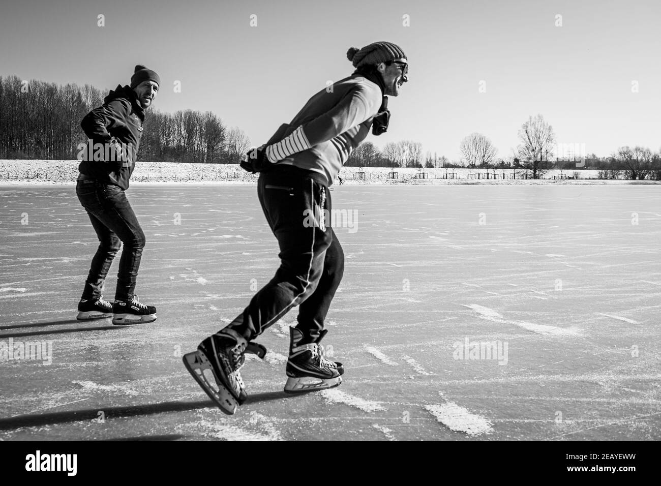 Illustration shows  people skating at natural ice at a frozen flood basin, in Leest, Thursday 11 February 2021. BELGA PHOTO JASPER JACOBS Stock Photo