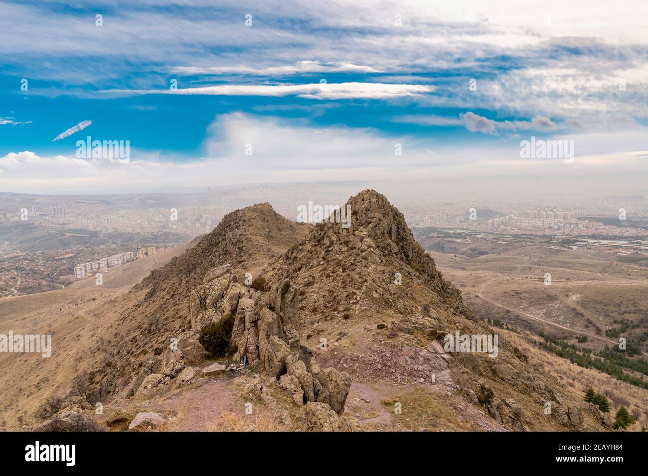 Huseyin Gazi hill and silhouette of Ankara behind the hill, Mamak, Ankara, Turkey Stock Photo