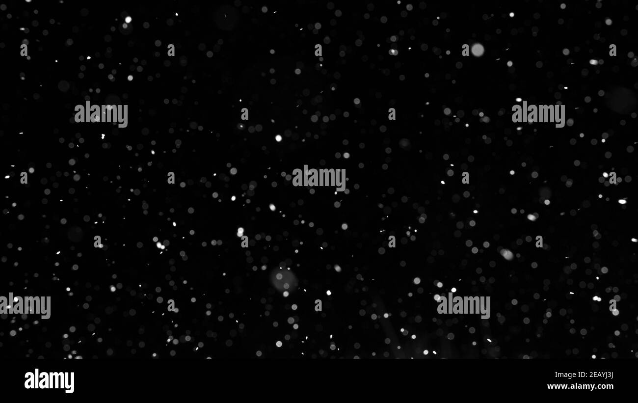 Bokeh of white snow on a black background. Snowfall - new design ...