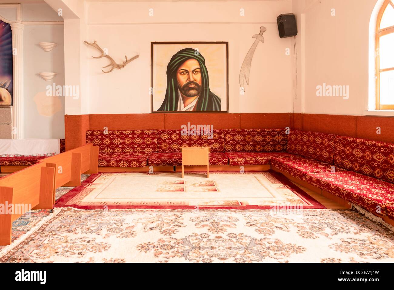 Ankara, Turkey - February 8 2021;  Carpeted room where alevi people pray here. Cem house (Cemevi in Turkish) which located Huseyin Gazi hill. Stock Photo