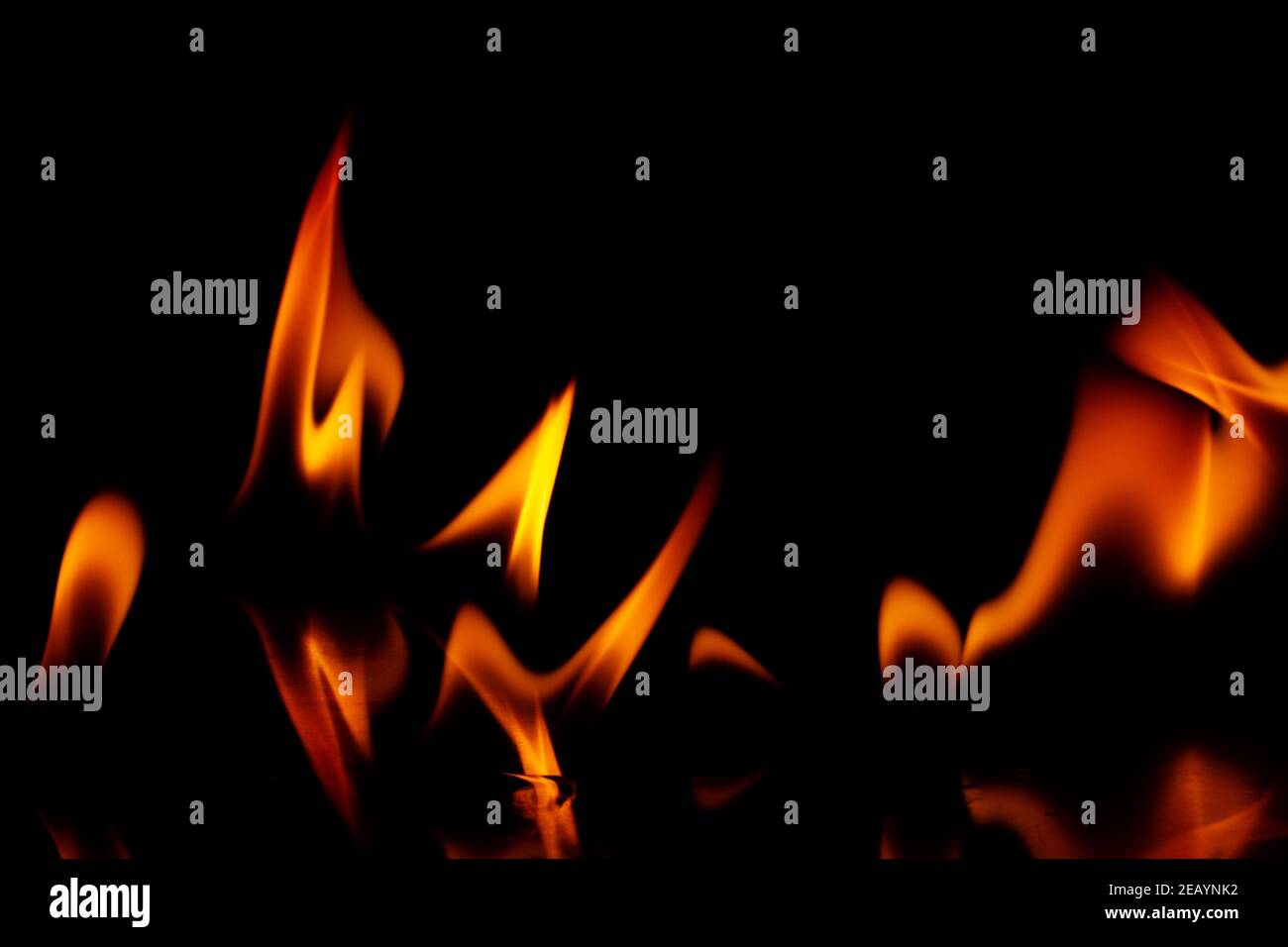 Fire flames isolated on a black background Stock Photo - Alamy