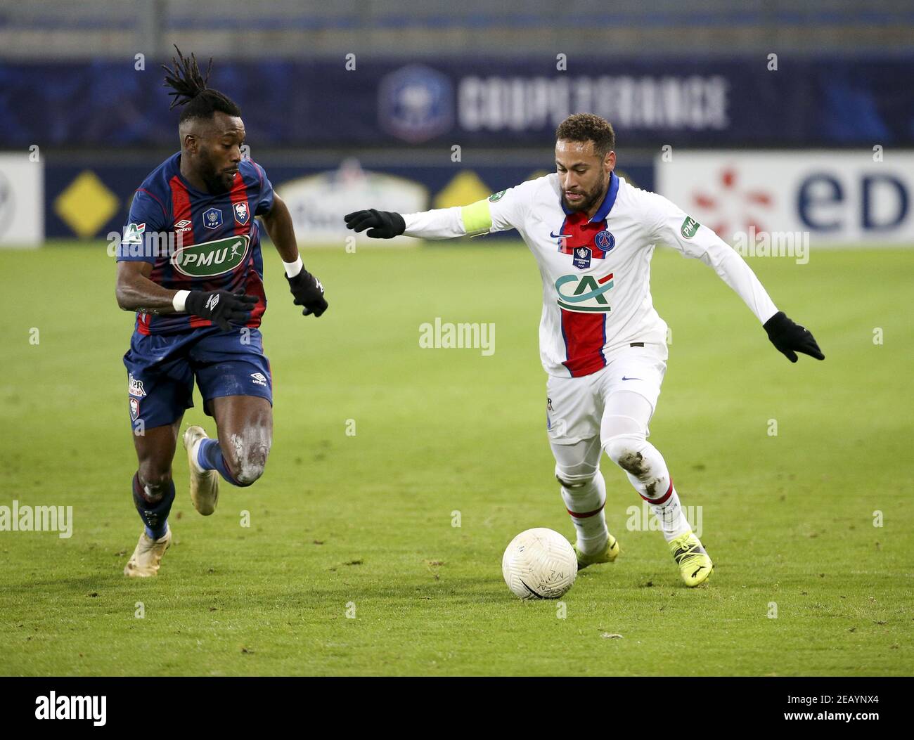 Neymar Jr of PSG, Steeve Yago of Caen (left) during the French Cup, round  of 64 football match between Stade Malherbe de Caen (SM Caen) and Paris  Saint-Germain (PSG) on February 10,