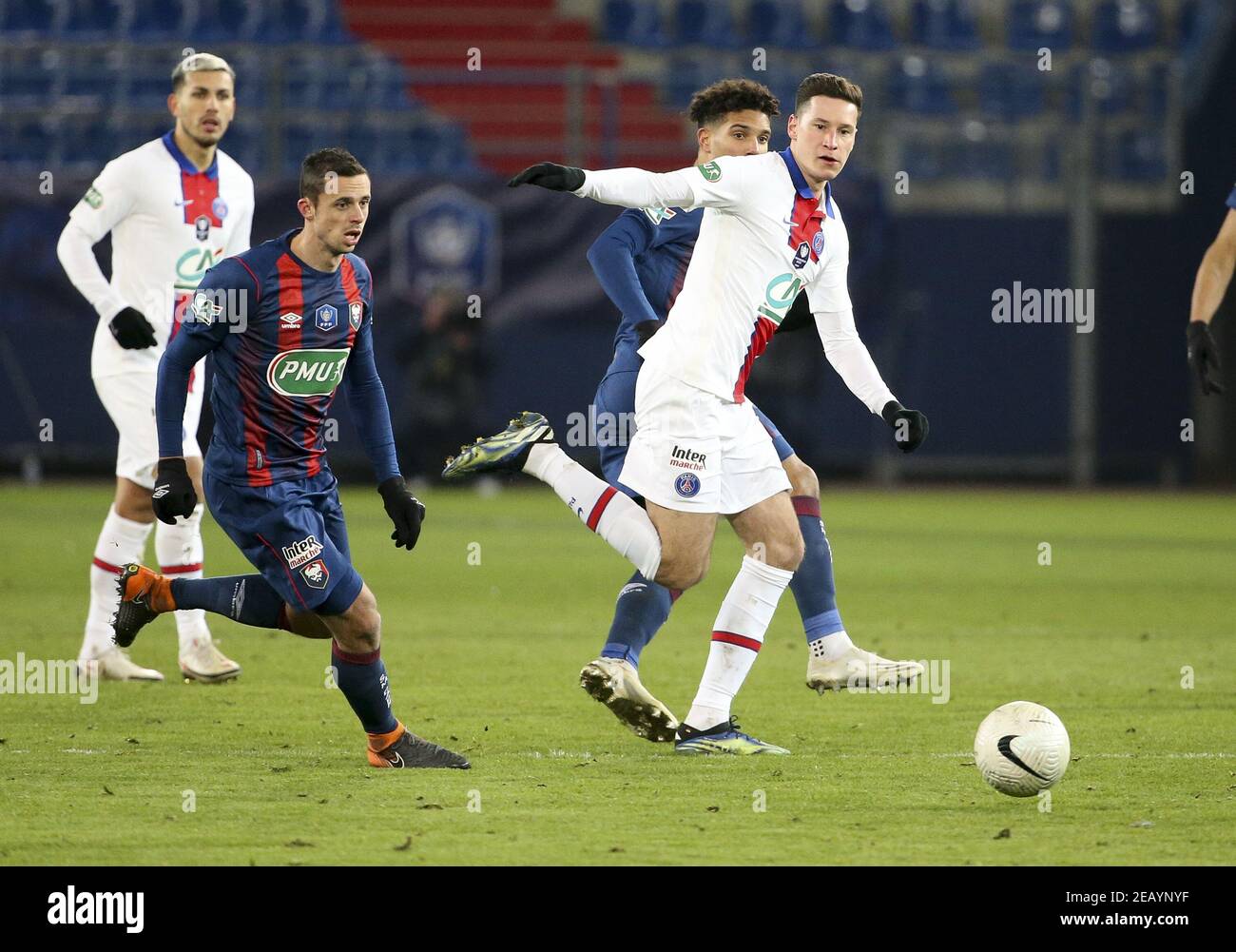 Julian Draxler of PSG, Jessy Pi of Caen (left) during the French Cup, round  of 64 football match between Stade Malherbe de Caen (SM Caen) and Paris  Saint-Germain (PSG) on February 10,