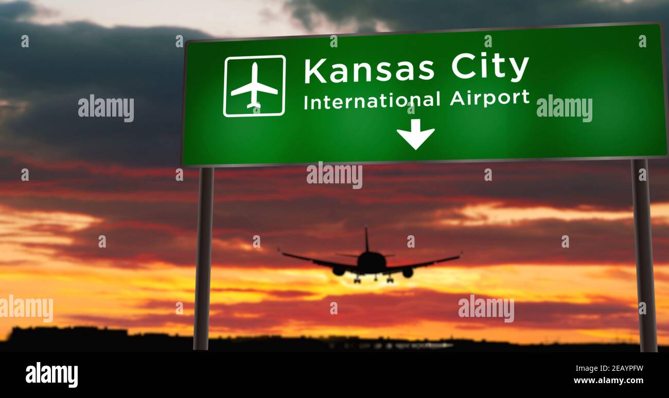 Airplane silhouette landing in Kansas City, Missouri, USA. City arrival