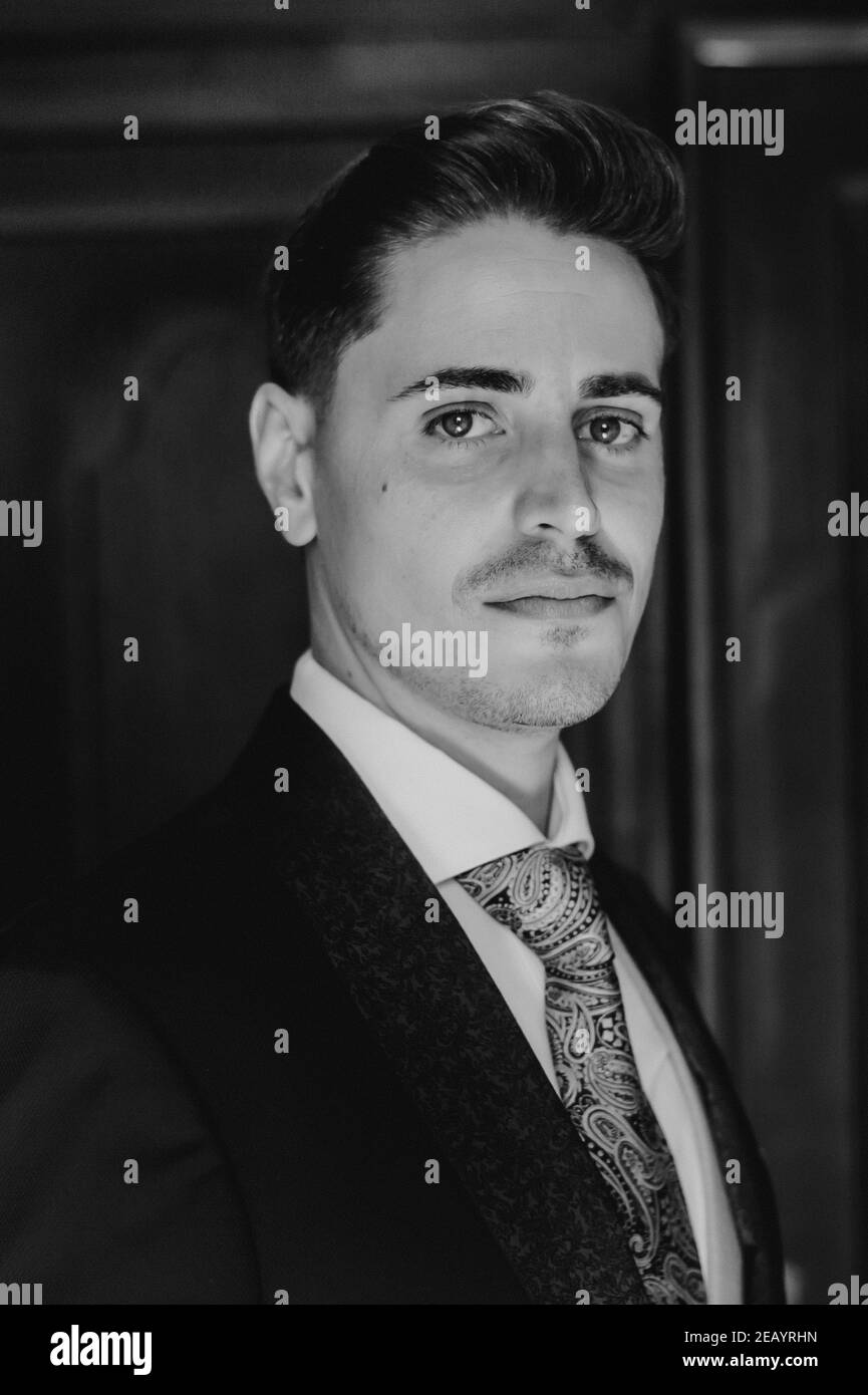 Portrait of an elegant young man in black and white Stock Photo - Alamy