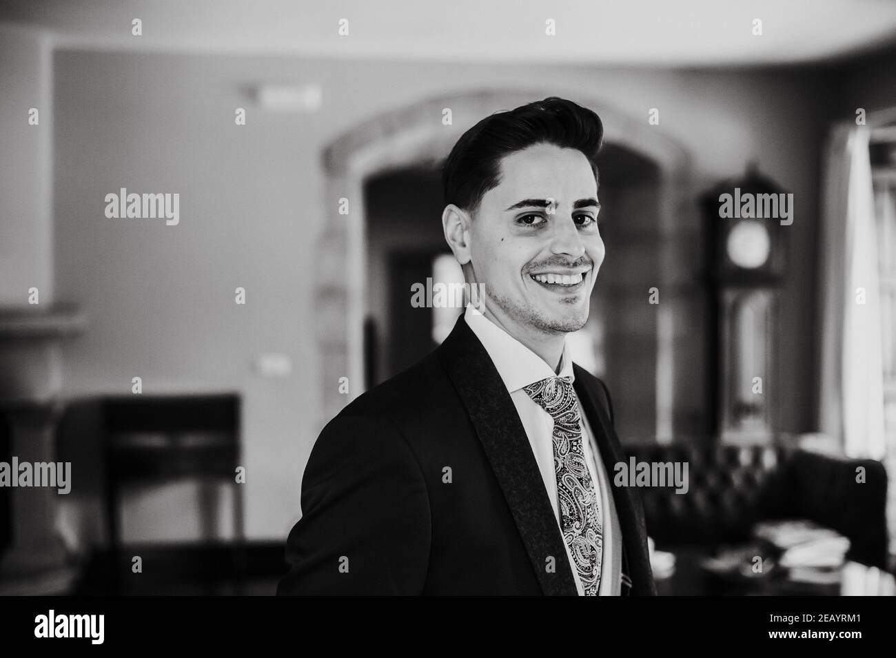 Portrait of an elegant young man in black and white Stock Photo