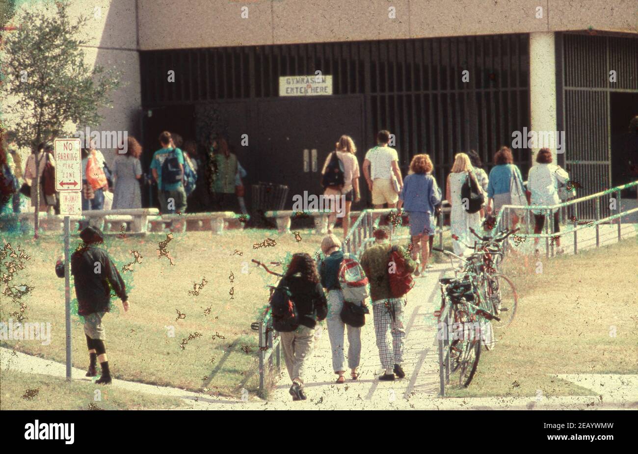 High school students at Brownsville, TX Lopez High enter the school building. ©Bob Daemmrich Stock Photo