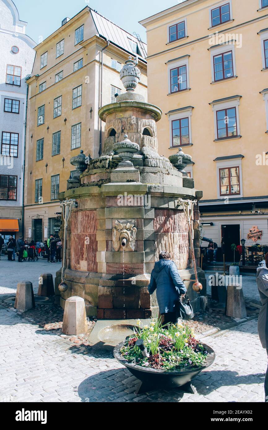 Stockholm, Sweden - May 1, 2019 : Stortorget Square in Gamla Stan, Old Town. Sunny day at Stockholm city center. City tour concept and spring vacation Stock Photo