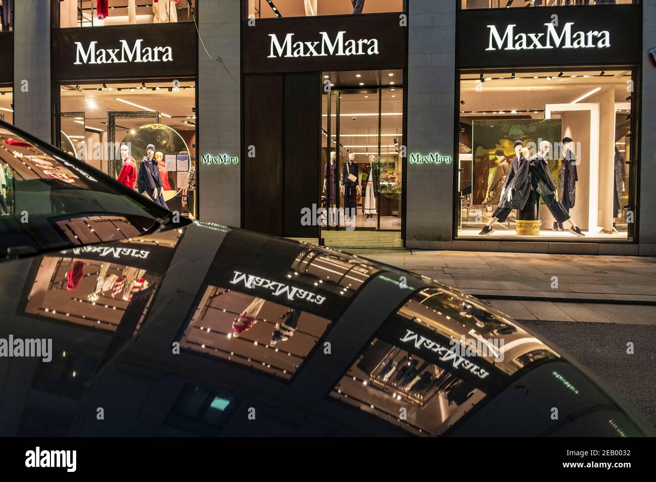London, UK. 10th Feb, 2021. A reflection of Max Mara in a car in New Bond  Street in London, UK on February 10, 2021 during the third nationwide  lockdown. Max Mara is