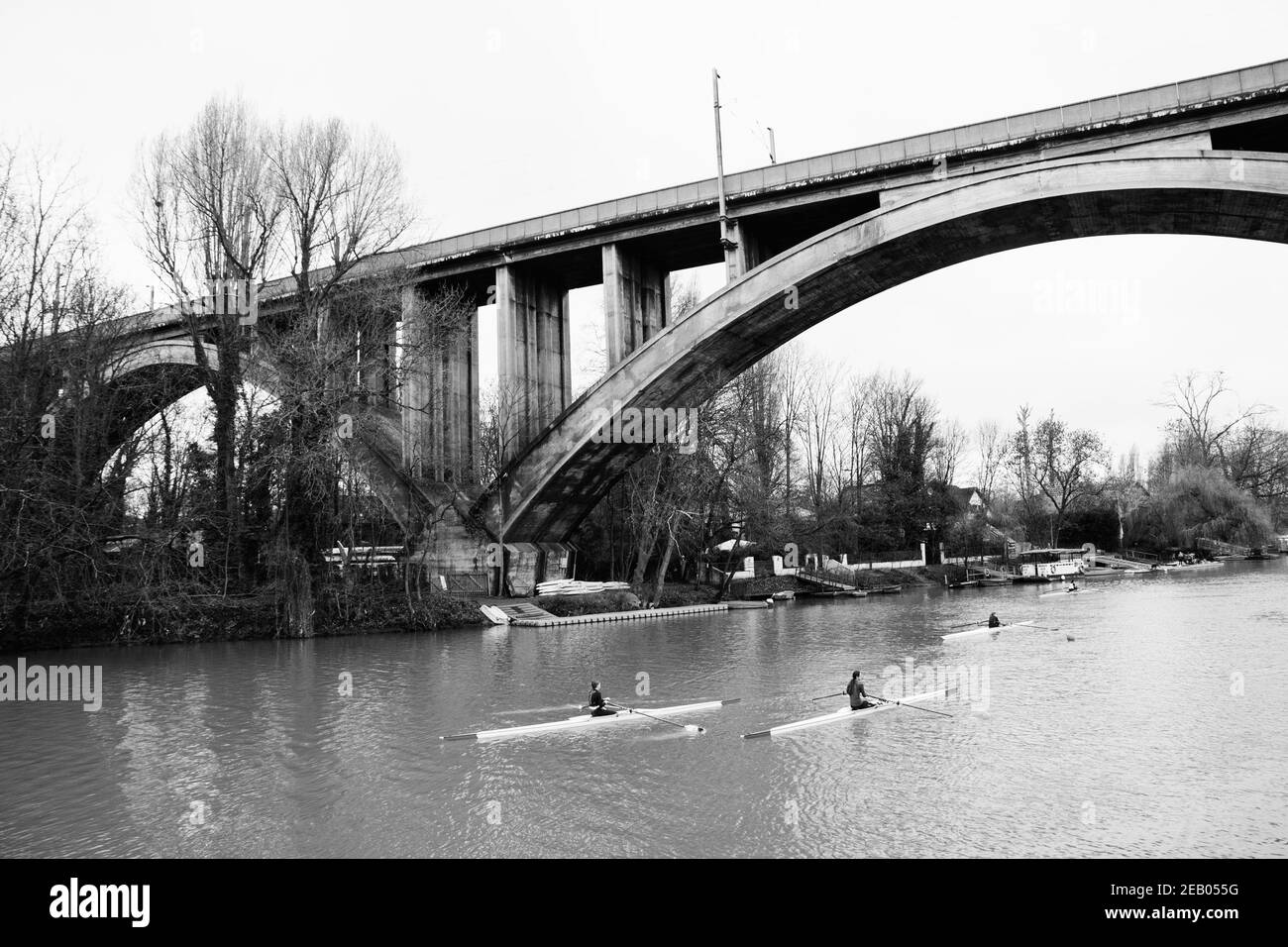 ILE-DE-FRANCE, FRANCE - JANUARY 26, 2019: Junior rowers training at Marne river. Black white historic photo. Stock Photo
