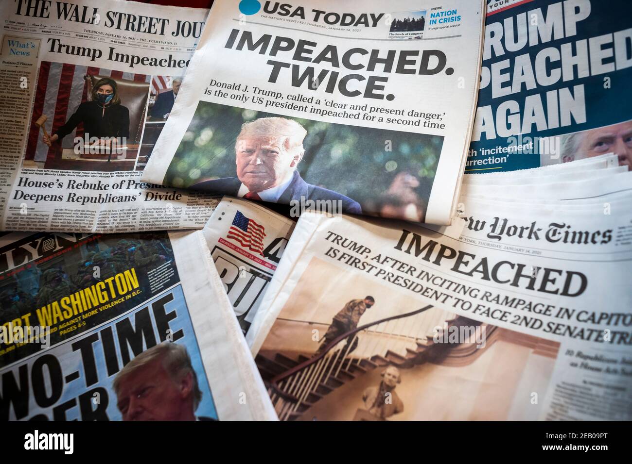 Headlines of newspapers in New York on Thursday, January 14, 2021 report on the second impeachment of President Donald Trump. (© Richard B. Levine) Stock Photo