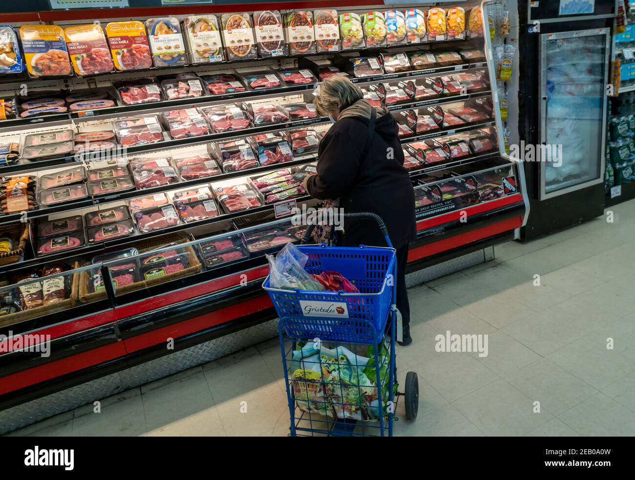 Senior citizen in the butcher department of a supermarket in New York on Tuesday, January 19, 2021. (© Richard B. Levine) Stock Photo