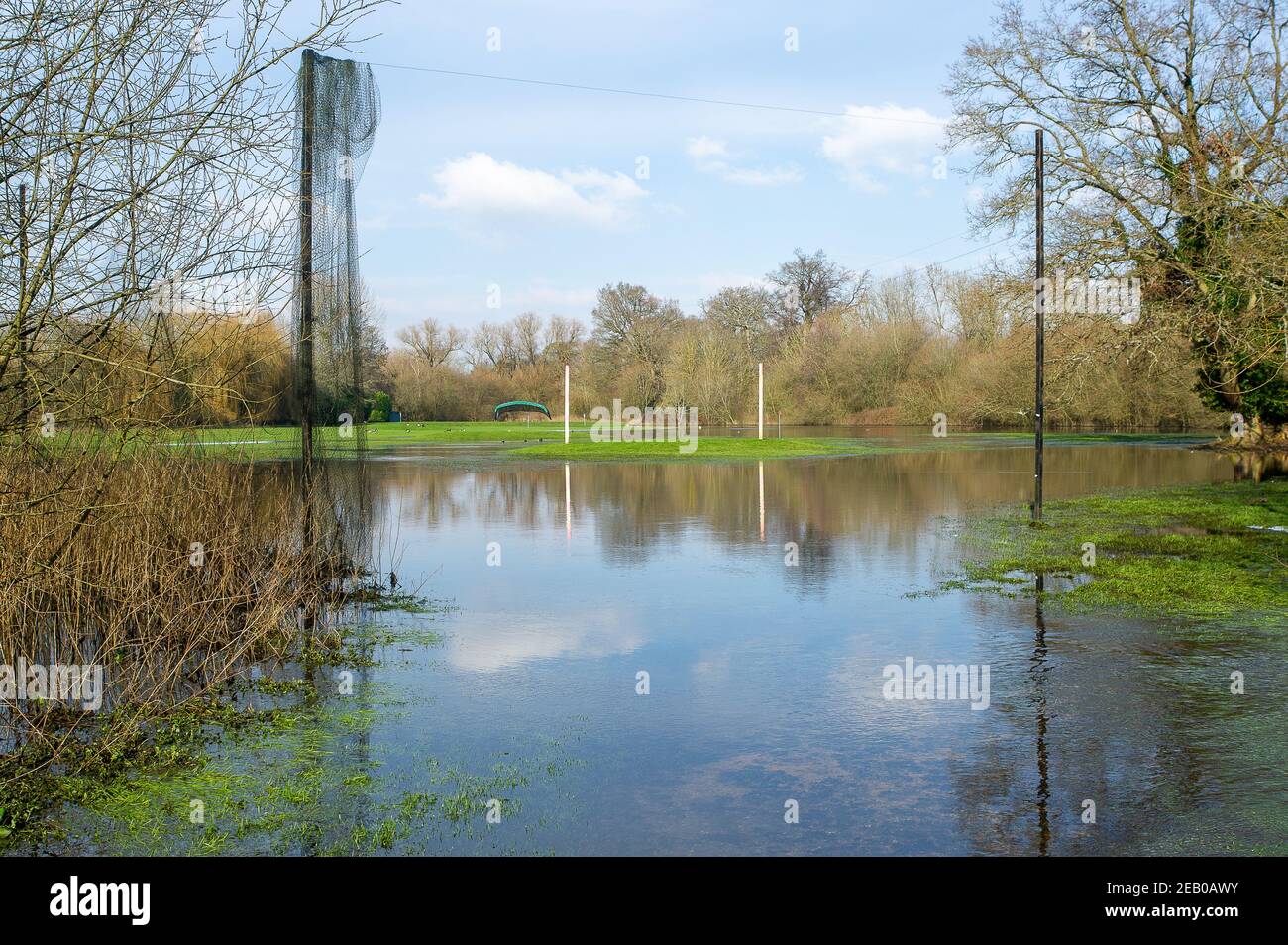 Denham, Buckinghamshire, UK. 11th February, 2021. The flooded driving range at the Buckinghamshire Golf Club. Following recent heavy rainfall the River Colne in Denham Country Park has burst its banks. Due to sustained freezing temperatures, both patches of snow and flooding remain in parts of the park. Credit: Maureen McLean/Alamy Live News Stock Photo