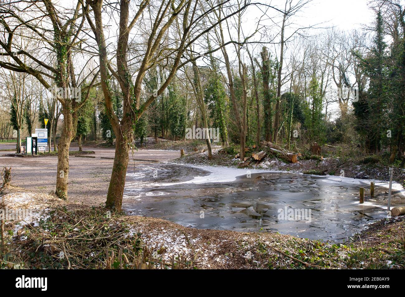 Denham, Buckinghamshire, UK. 11th February, 2021. Frozen water in one of the car parks at Denham Country Park. Following recent heavy rainfall the River Colne in Denham Country Park has burst its banks. Due to sustained freezing temperatures, both patches of snow and flooding remain in parts of the park. Credit: Maureen McLean/Alamy Live News Stock Photo