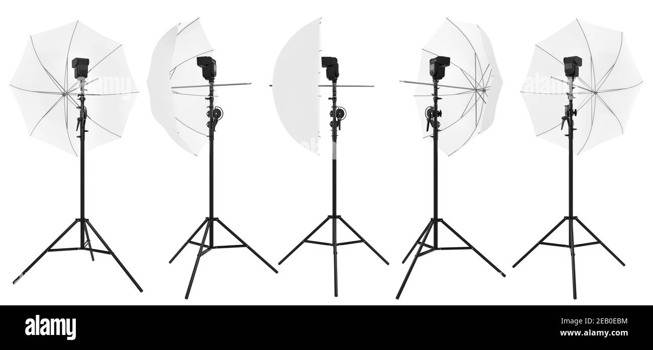 Photography studio lighting stand with speedlight and umbrella isolated