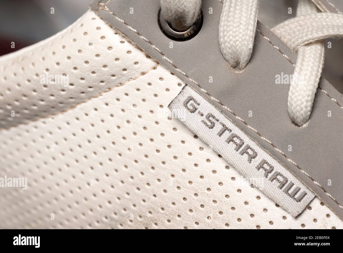 G-Star fabric clothing label on white men's shoes close up detail Stock - Alamy