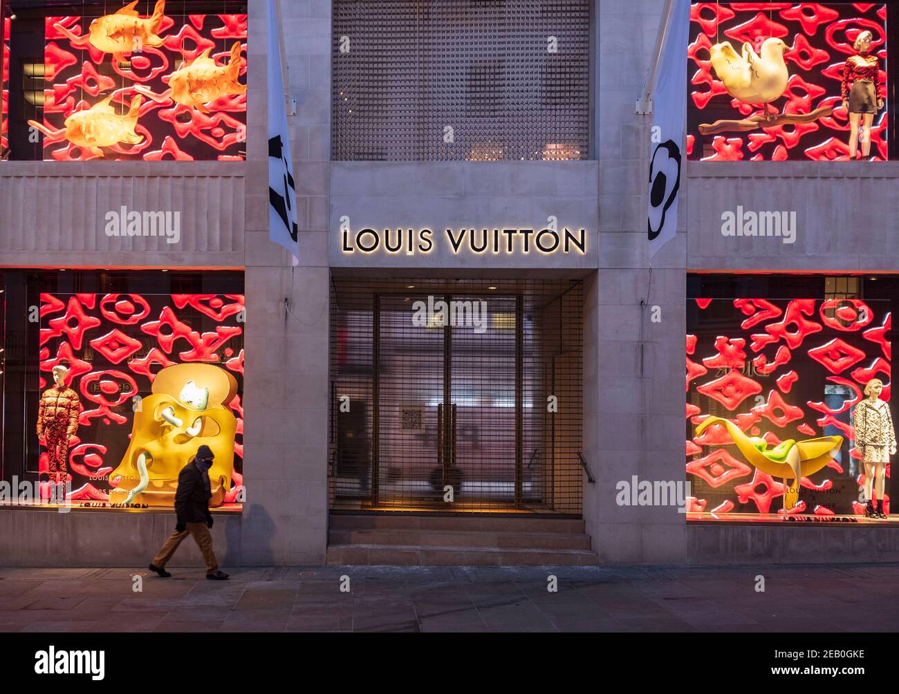 London, UK. 10th Feb, 2021. A man walking past the Louis Vuitton in London, during the nationwide lockdown. Louis Vuitton commonly known as Louis Vuitton or shortened to is