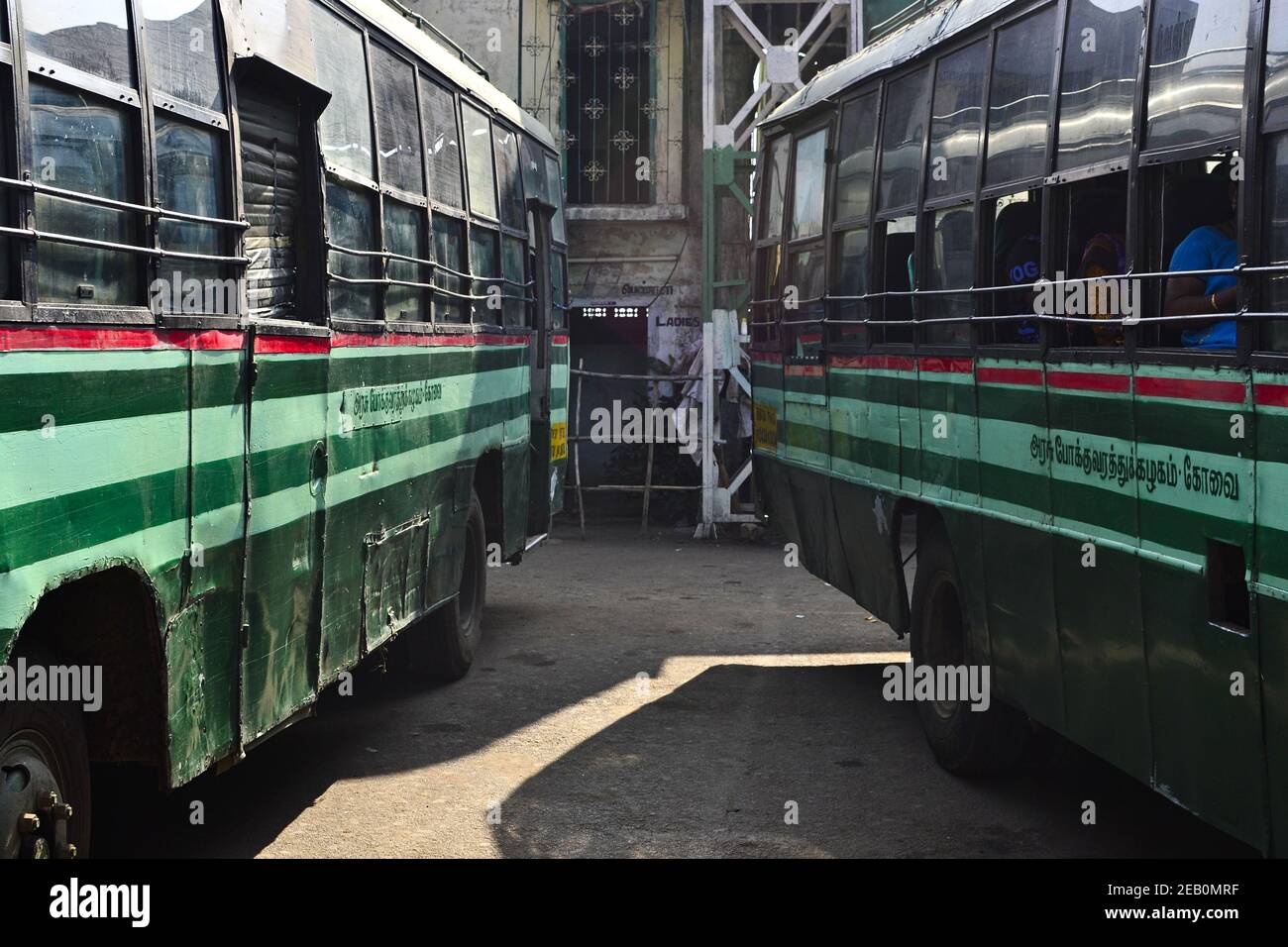 Sulthan Bathery, Kerala, India - January, 2017: Two green buses on the bus station. Stock Photo